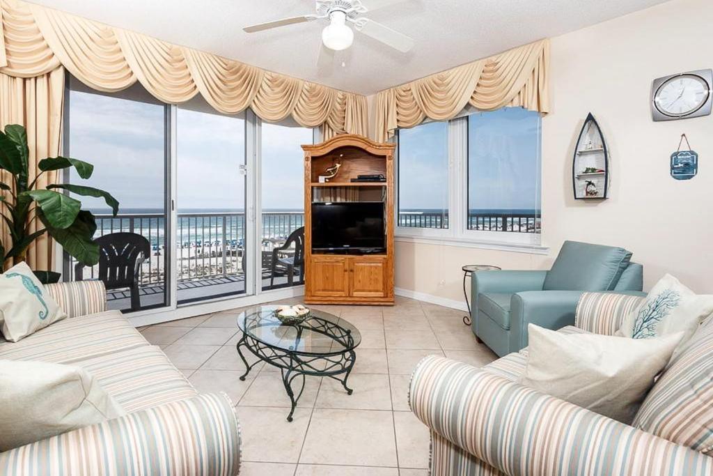 a living room with a view of the ocean at Summerwind Resort in Navarre