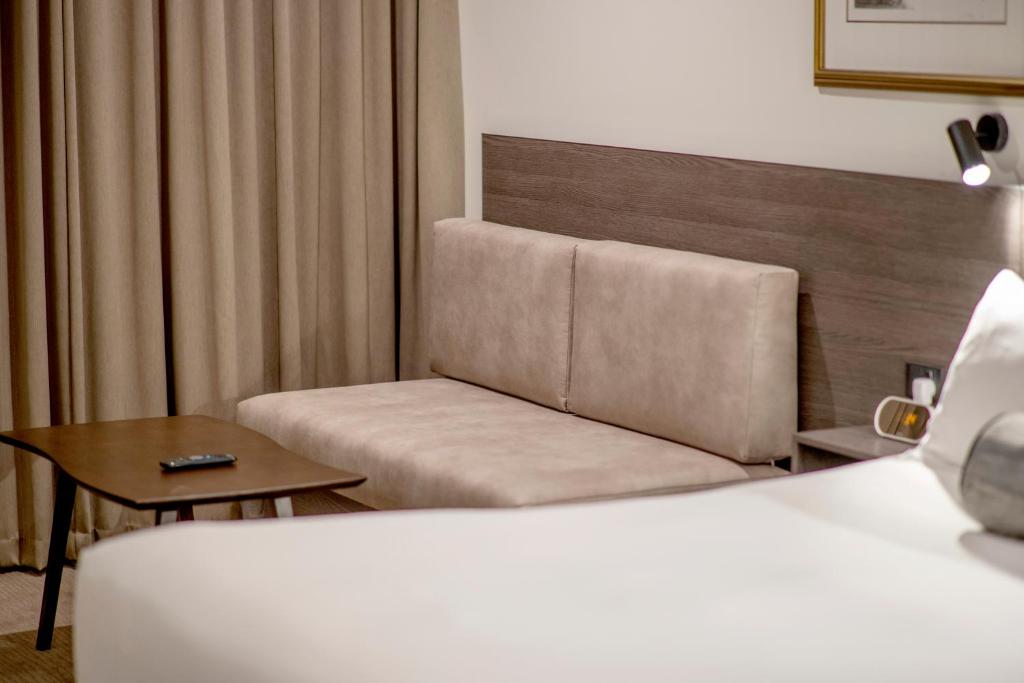 Postel nebo postele na pokoji v ubytování Duxton Hotel Perth