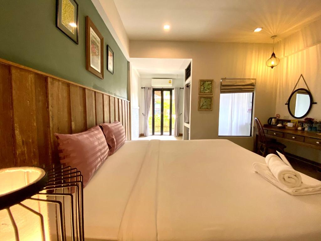 Postel nebo postele na pokoji v ubytování Hotel Toscana Trat