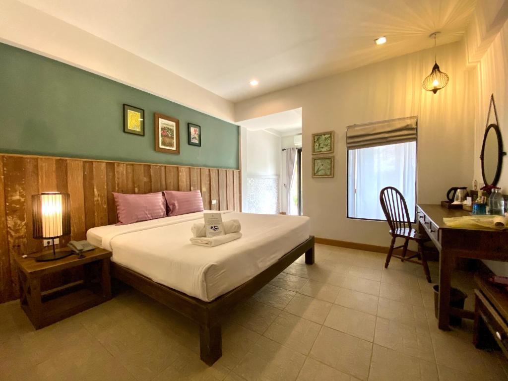 Postel nebo postele na pokoji v ubytování Hotel Toscana Trat
