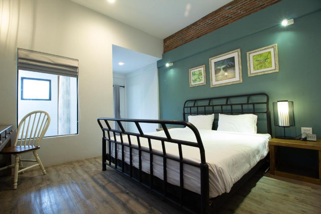 Postel nebo postele na pokoji v ubytování Hotel Toscana Trat