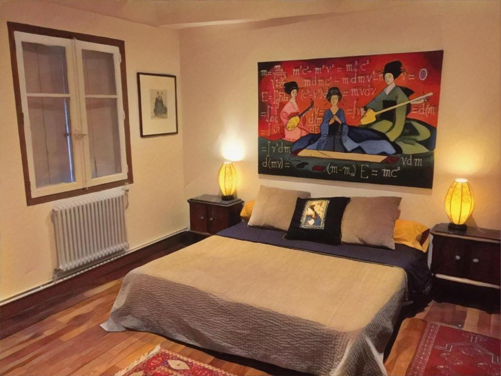 1 dormitorio con 1 cama y una gran pintura en la pared en Appartement Narada à Limoux, en Limoux