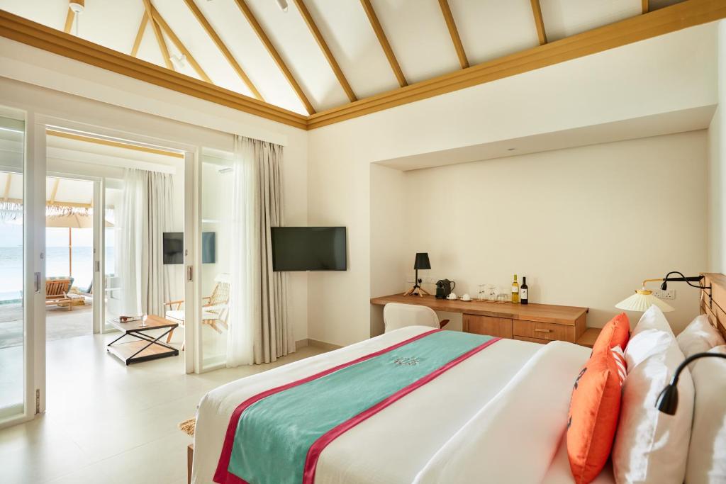 Postel nebo postele na pokoji v ubytování Sun Siyam Iru Veli - 24 Hours Premium All-Inclusive with Free Transfers