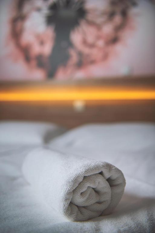 A bed or beds in a room at Apartmány Zaria