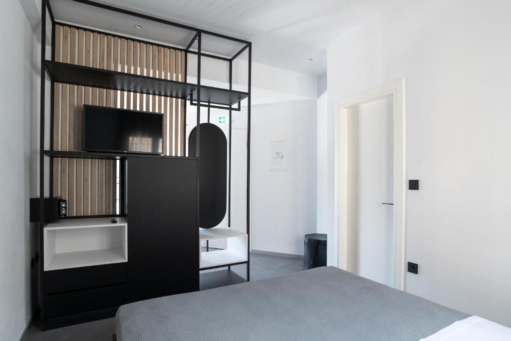 A bed or beds in a room at White 9