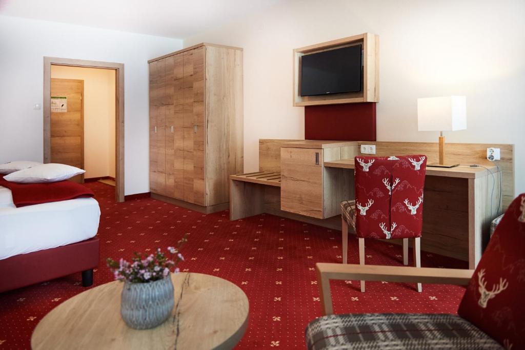 Postel nebo postele na pokoji v ubytování Hotel Kerschbaumer