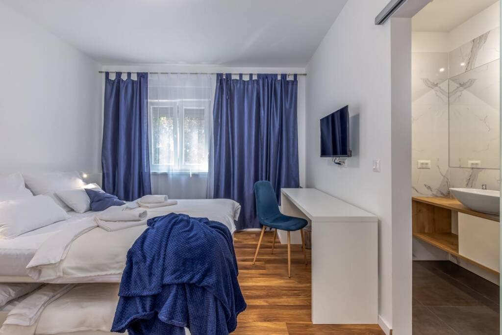 Postel nebo postele na pokoji v ubytování Villa Aurus - Luxury 5 bedroom