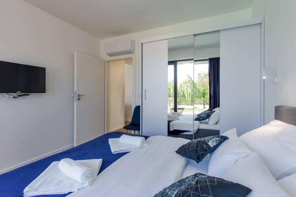 Postel nebo postele na pokoji v ubytování Villa Aurus - Luxury 5 bedroom