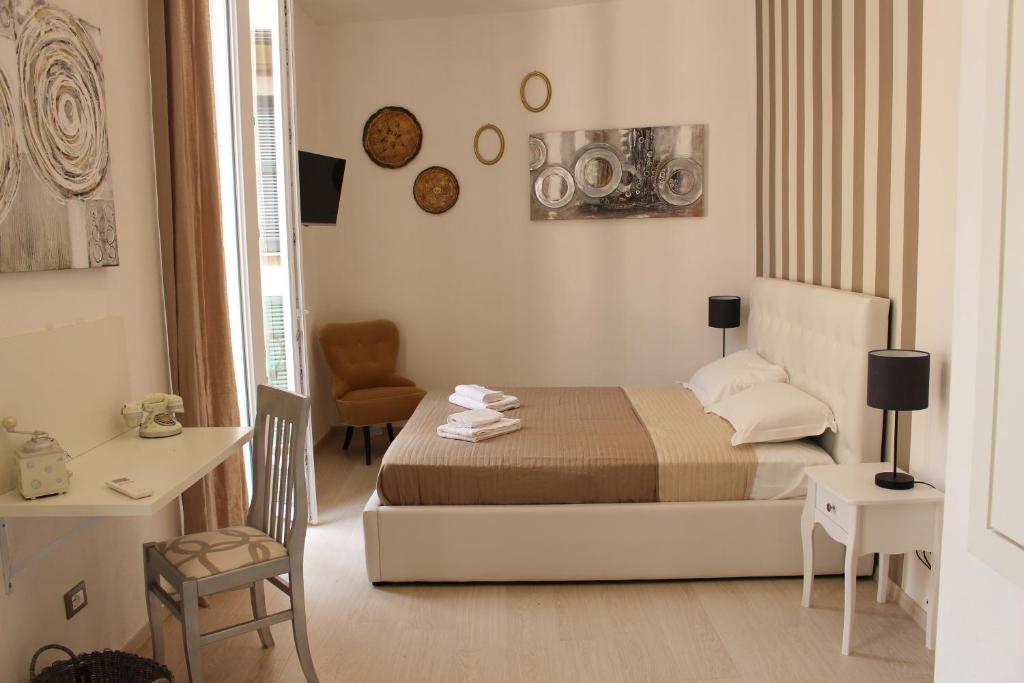 Postel nebo postele na pokoji v ubytování Maestrale Charme Rooms