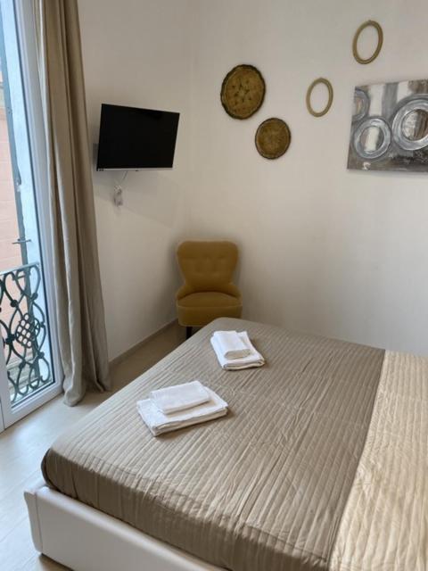 Postel nebo postele na pokoji v ubytování Maestrale Charme Rooms