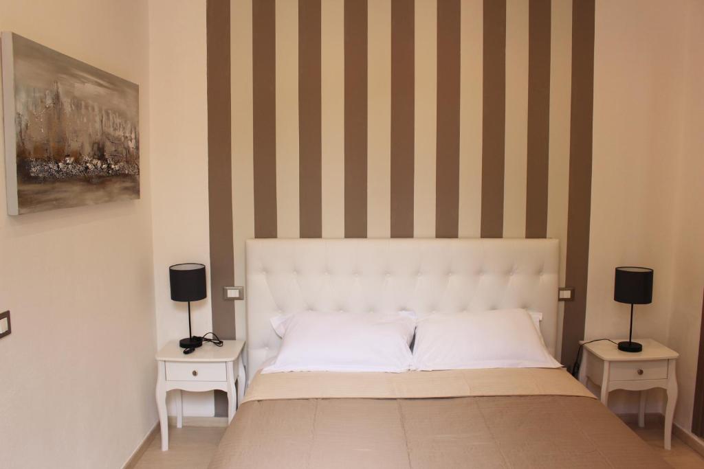Postel nebo postele na pokoji v ubytování Maestrale Charme Rooms