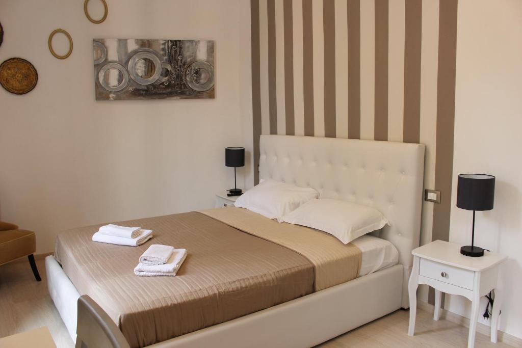 Postel nebo postele na pokoji v ubytování Maestrale Charme Rooms