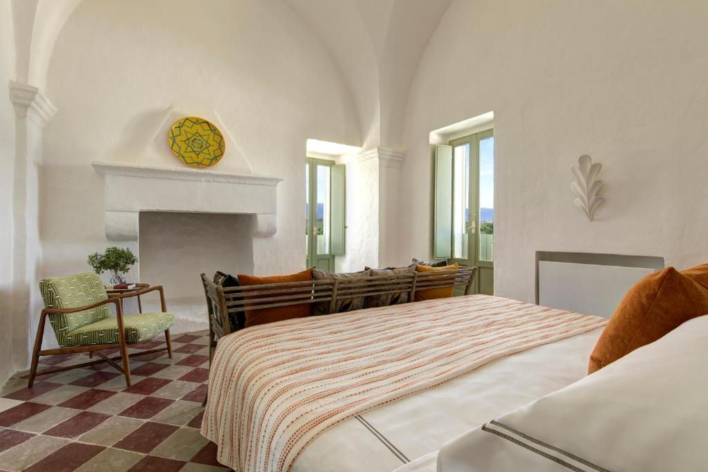 Postel nebo postele na pokoji v ubytování Rocco Forte Masseria Torre Maizza