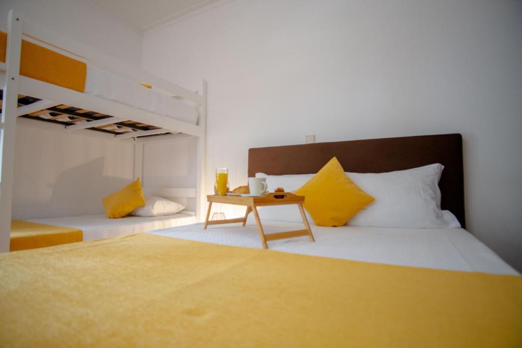 Postel nebo postele na pokoji v ubytování Gerês Guest House