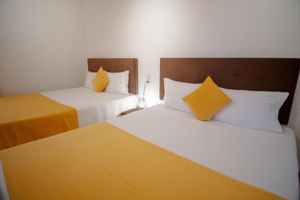 Postel nebo postele na pokoji v ubytování Gerês Guest House