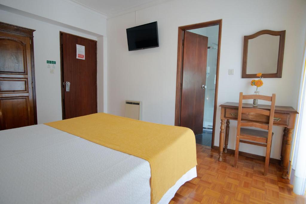 Postel nebo postele na pokoji v ubytování Gerês Guest House