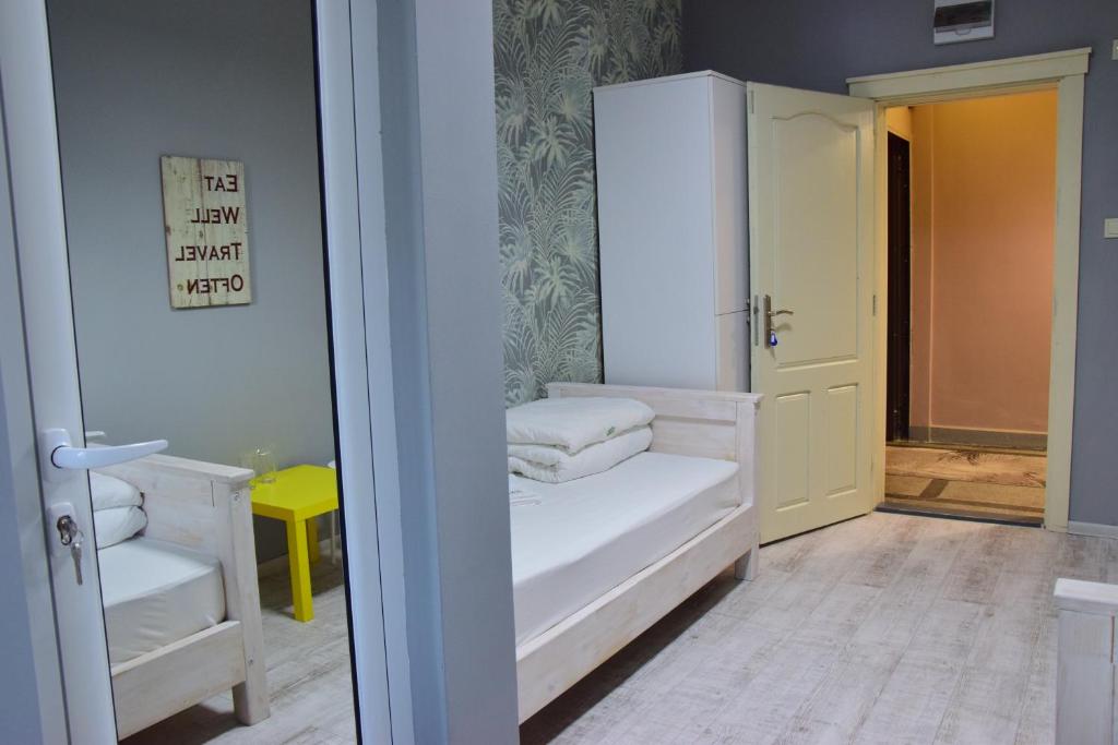 Postel nebo postele na pokoji v ubytování Hostel Kyosheto