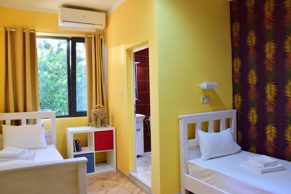 Postel nebo postele na pokoji v ubytování Hostel Kyosheto