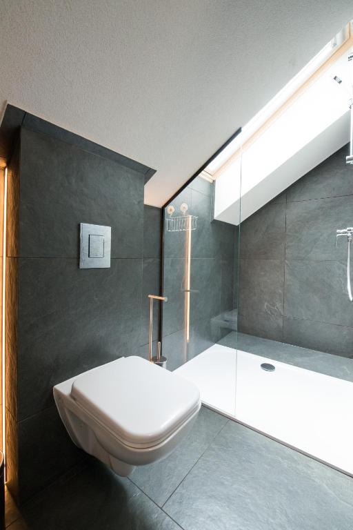 Kúpeľňa v ubytovaní Apartamenty Minimal House