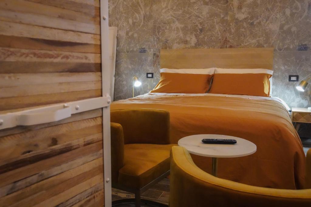 Postel nebo postele na pokoji v ubytování Rosso Cortese