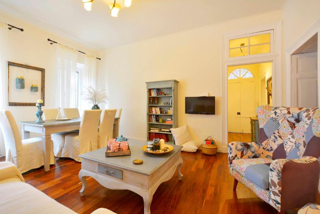 a living room with a couch and a table at Bonagrazia in Corfu Town