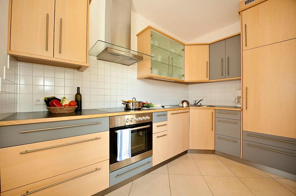 Kuchyň nebo kuchyňský kout v ubytování Villa Trogerhof