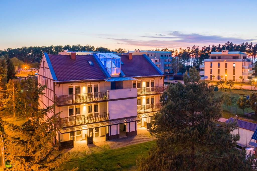 an aerial view of a house with a roof at Sztorm in Rewal