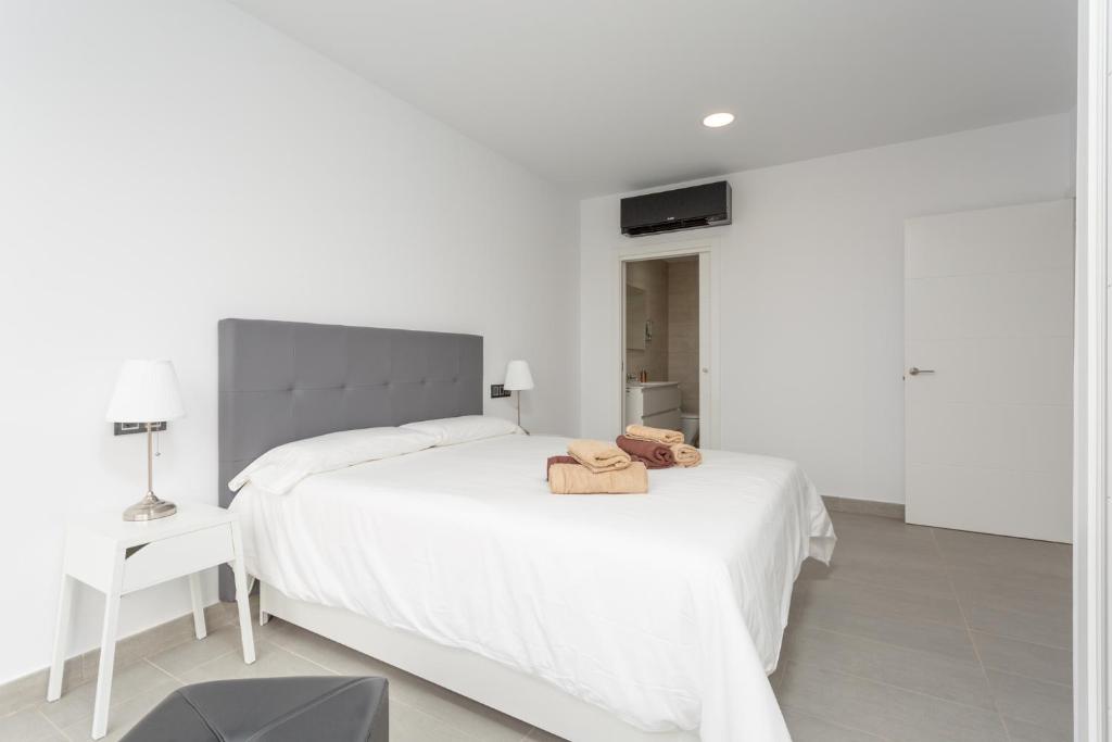 Postel nebo postele na pokoji v ubytování Villas Mariposas Dreams