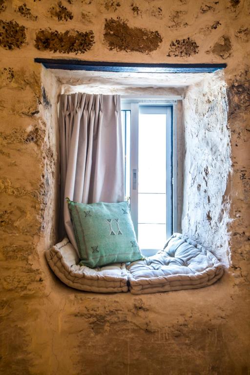 Postel nebo postele na pokoji v ubytování Tel-Aviv LALA Boutique Hotel