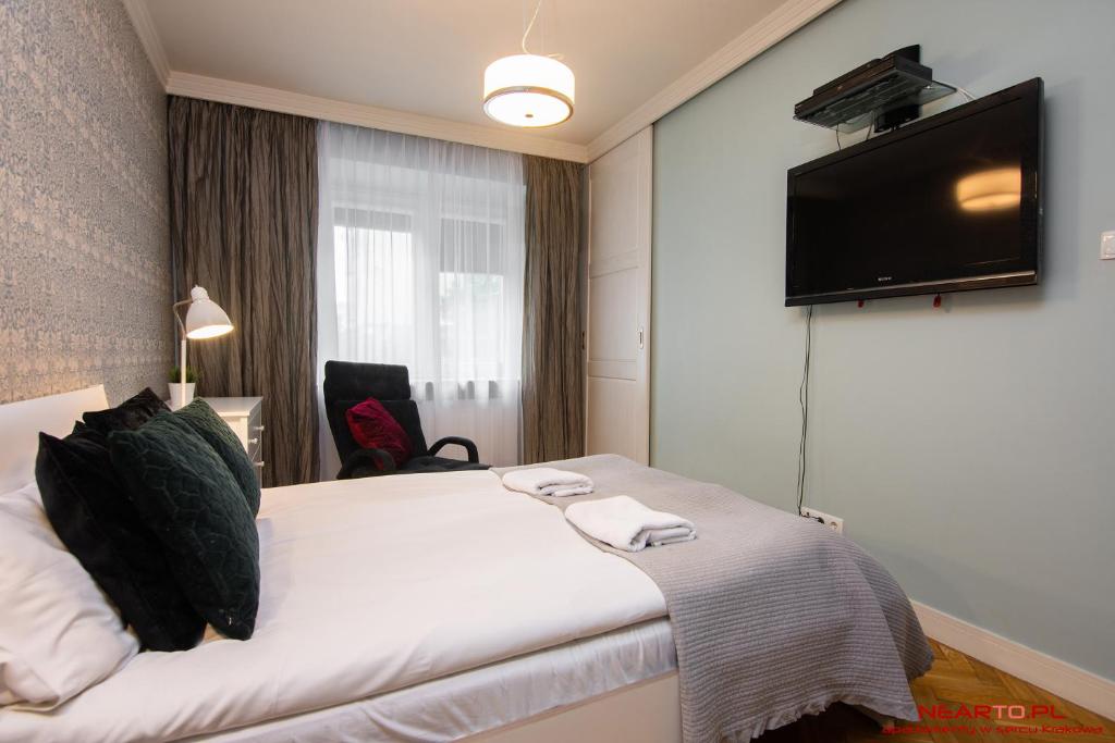 TV a/nebo společenská místnost v ubytování Apartment Nearto Old Town Daszyńskiego street