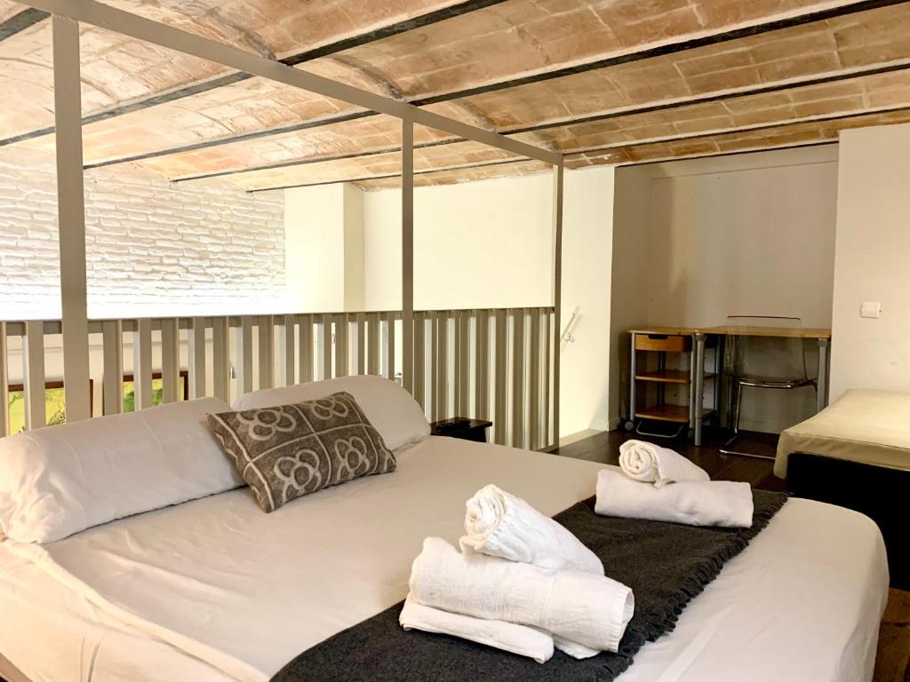 Posteľ alebo postele v izbe v ubytovaní Dalí Residence