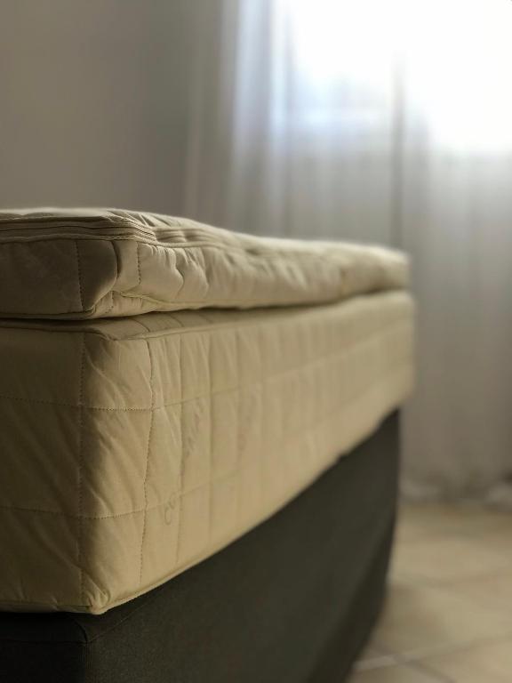 Postel nebo postele na pokoji v ubytování Volta Superior Studios