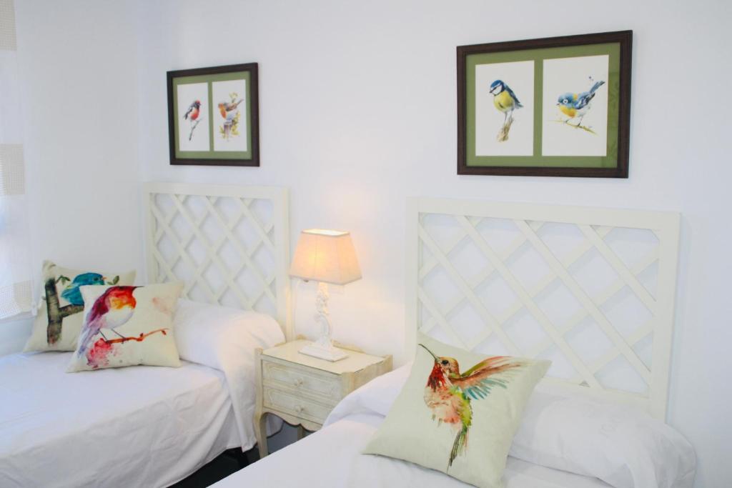 A bed or beds in a room at Nuevo apartamento en pleno centro