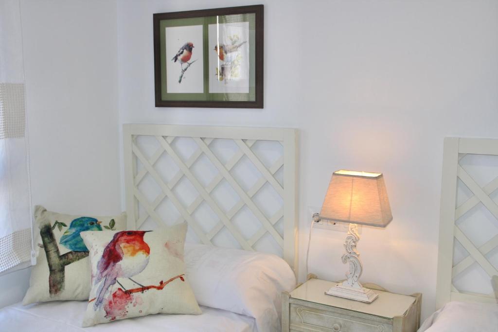 A bed or beds in a room at Nuevo apartamento en pleno centro