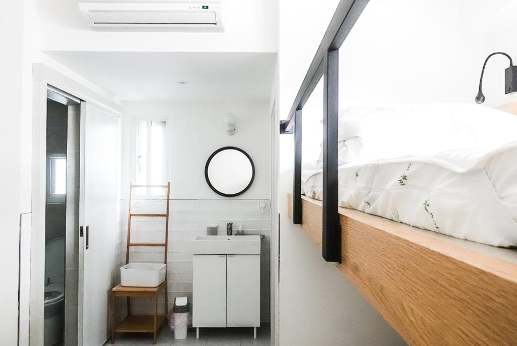 Postel nebo postele na pokoji v ubytování Ren Homestay
