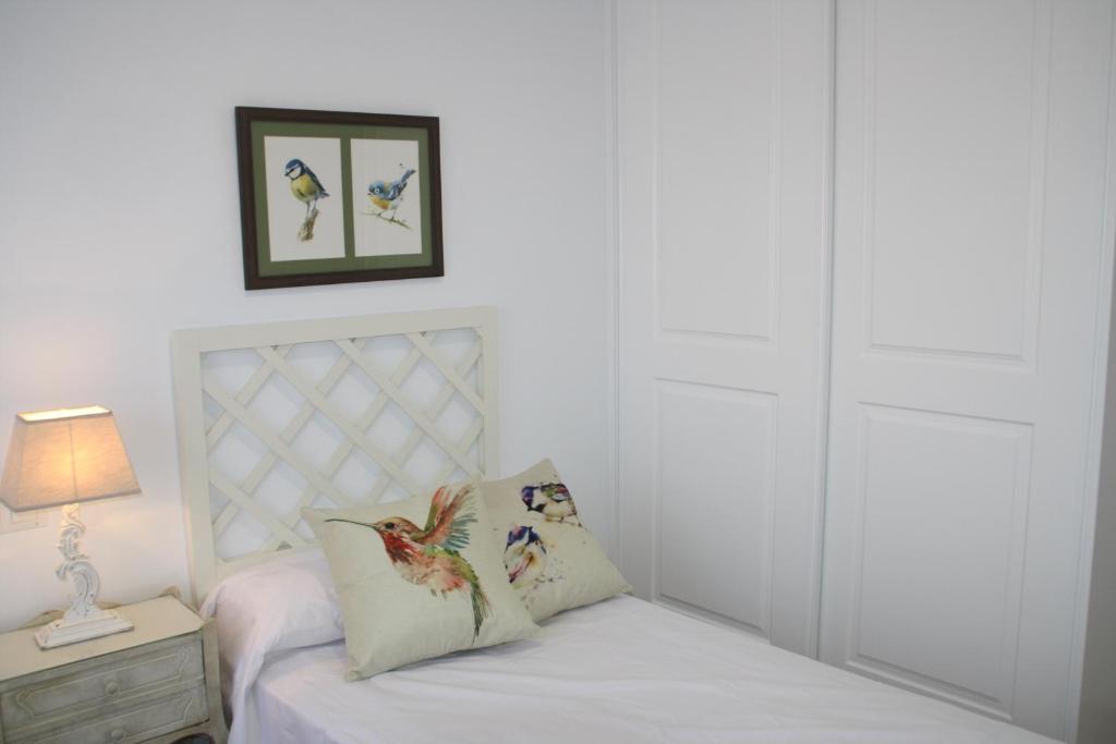 A bed or beds in a room at Nuevo apartamento en pleno centro