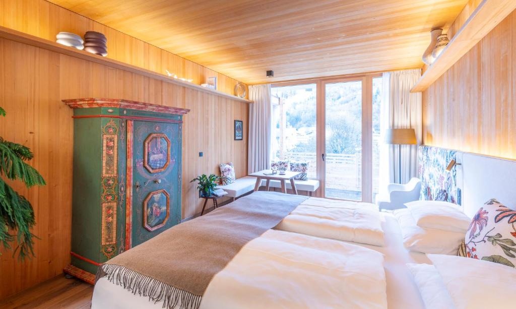 Postel nebo postele na pokoji v ubytování MalisGarten Green Spa Hotel