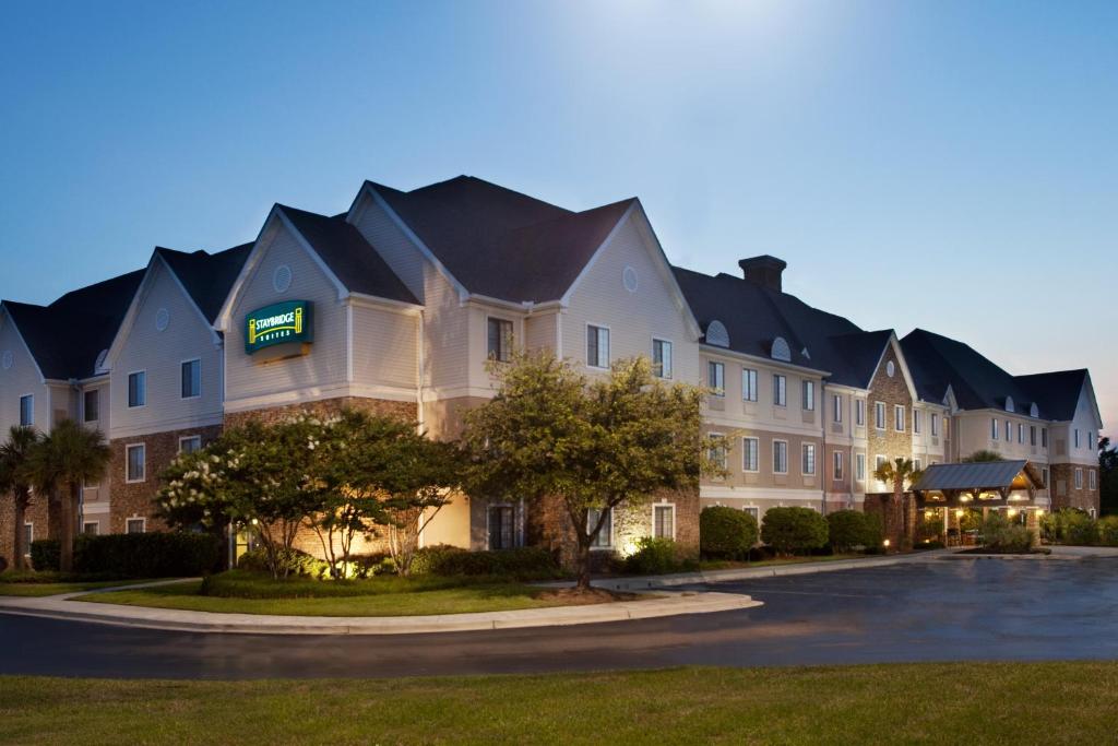 a large building with a sign on the side of it at Staybridge Suites Myrtle Beach-Fantasy Harbour, an IHG Hotel in Myrtle Beach