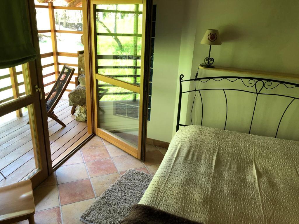 Posteľ alebo postele v izbe v ubytovaní B&B Maso Zont Antico Maso