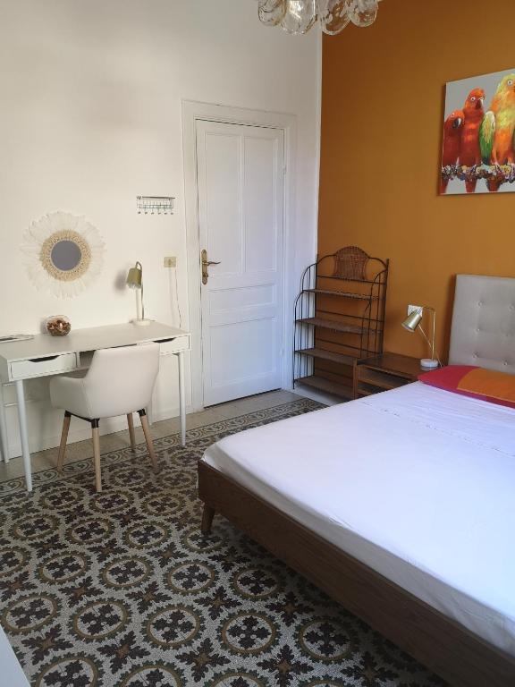 Letto o letti in una camera di Villa Corsini