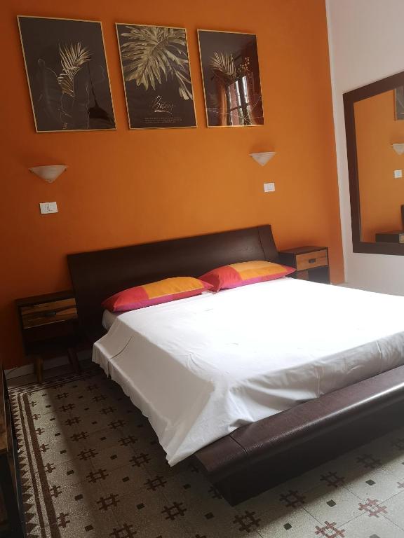 Letto o letti in una camera di Villa Corsini