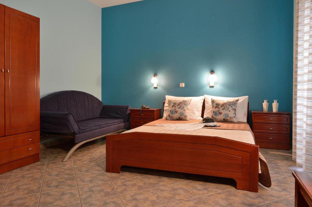 Postel nebo postele na pokoji v ubytování Hotel Stefanos