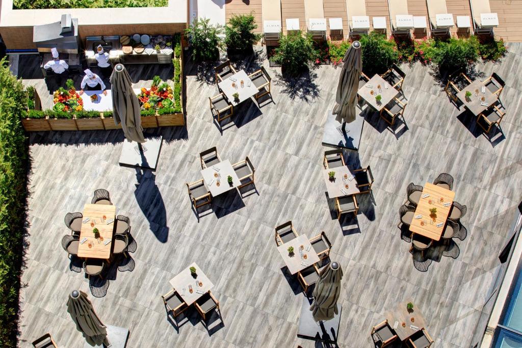 Reštaurácia alebo iné gastronomické zariadenie v ubytovaní Almar Jesolo Resort & Spa