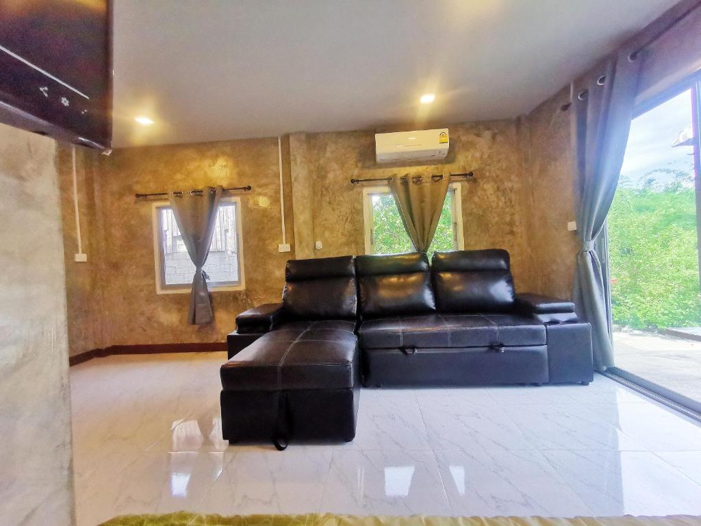 Posezení v ubytování Mint Organic Farm Stay, Wangchin,Phrae