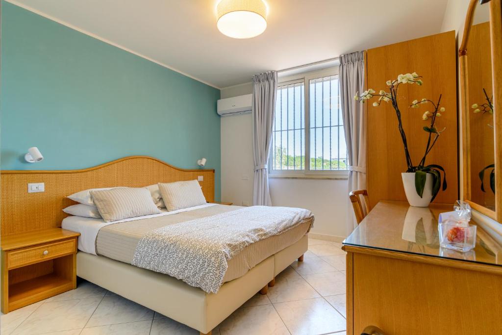 Postel nebo postele na pokoji v ubytování Hotel Mandetta - Adults Only