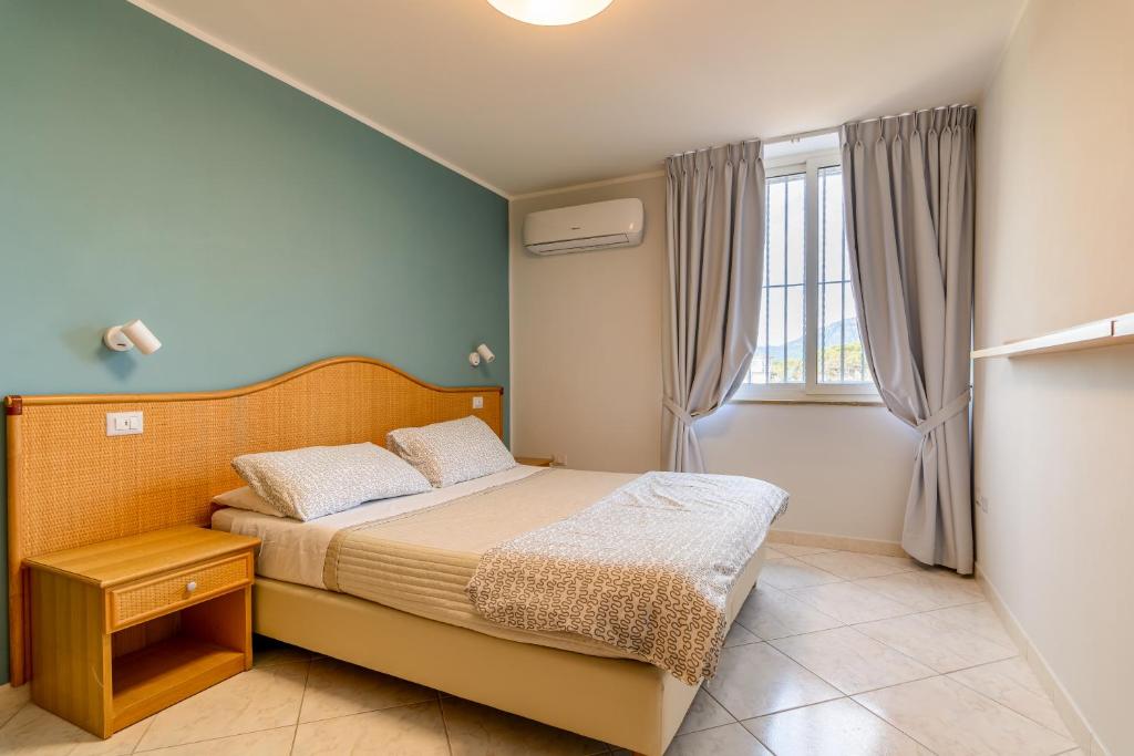 Postel nebo postele na pokoji v ubytování Hotel Mandetta - Adults Only