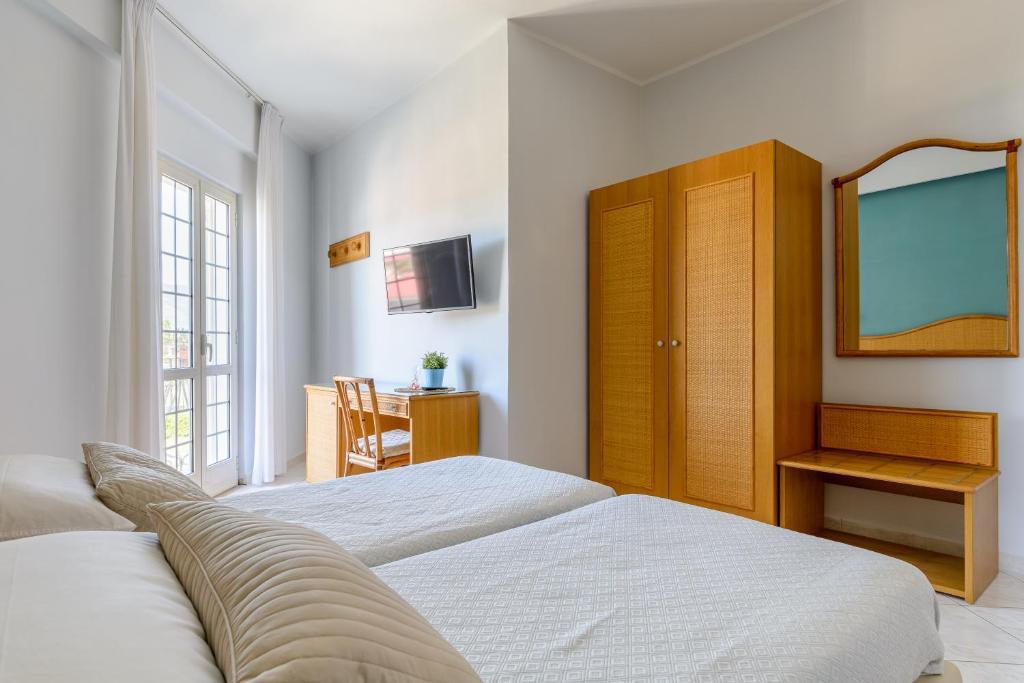 Postel nebo postele na pokoji v ubytování Hotel Mandetta - Adults Only