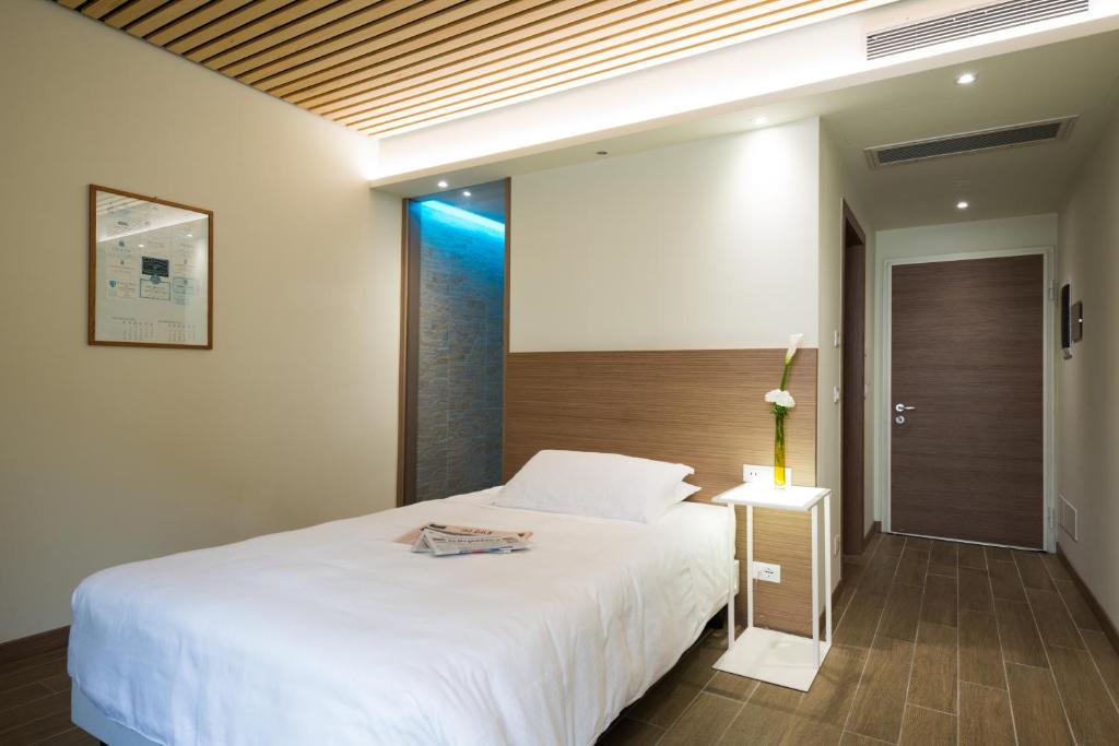 Postel nebo postele na pokoji v ubytování Hotel Marelet