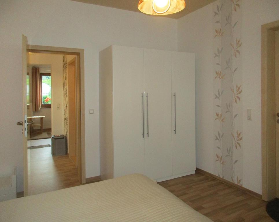 Postel nebo postele na pokoji v ubytování Ferienwohnung Schrammsteine