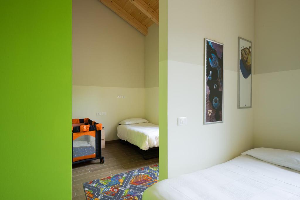 Postel nebo postele na pokoji v ubytování Hotel Marelet